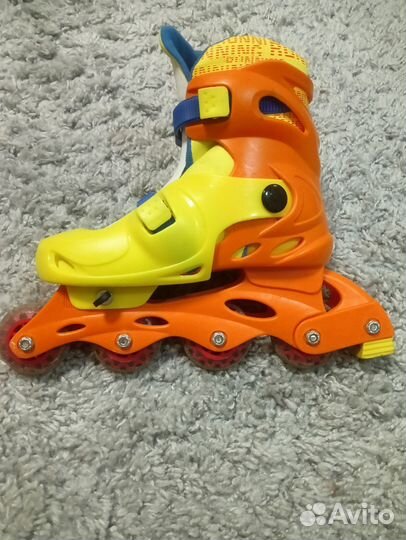 Роликовые коньки