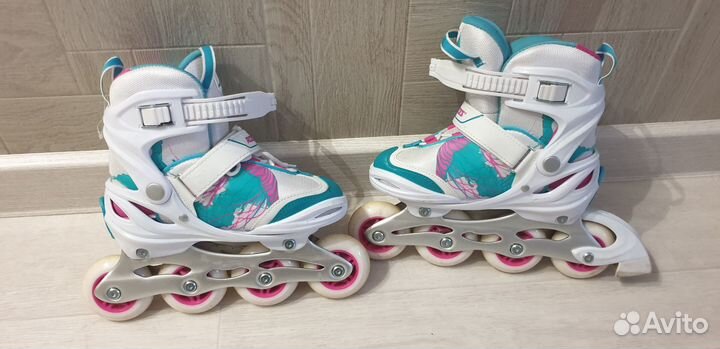 Роликовые коньки