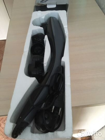 Ручной электрический массажер с насадками