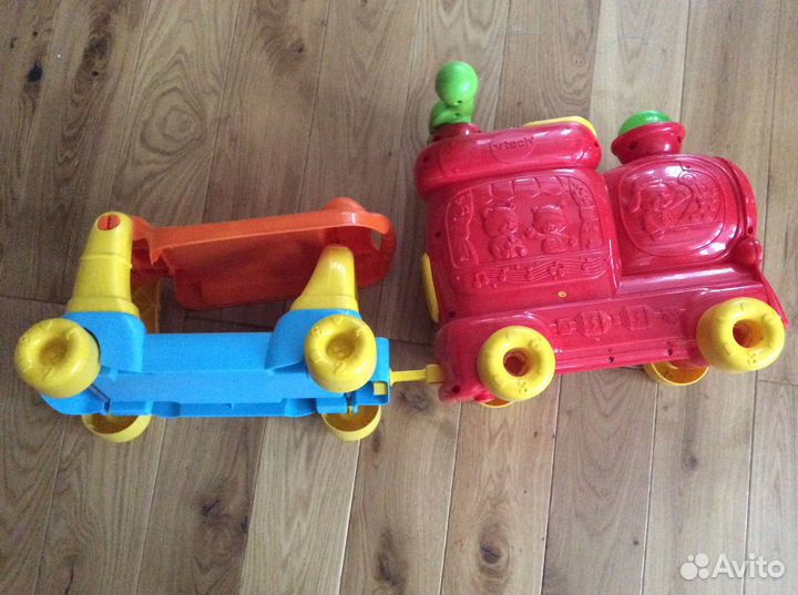 Веселый паровозик Развивающая игрушка каталка