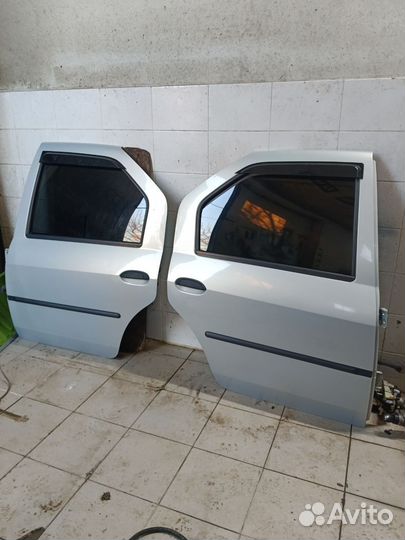 Задние двери Рено Логан 1