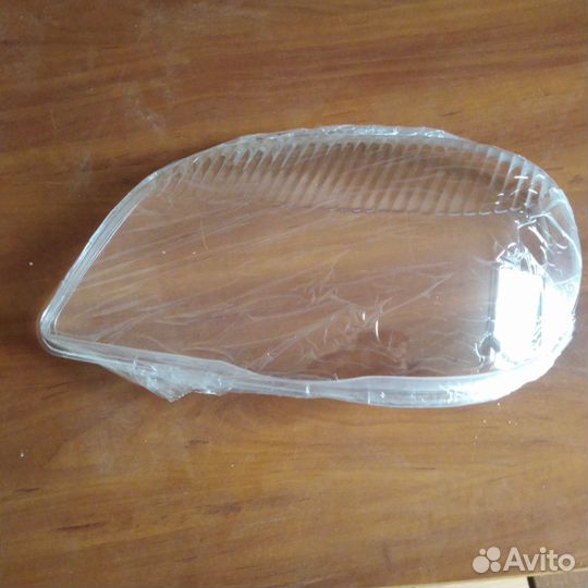 Стекло фары chevrolet niva левое (пласт.)