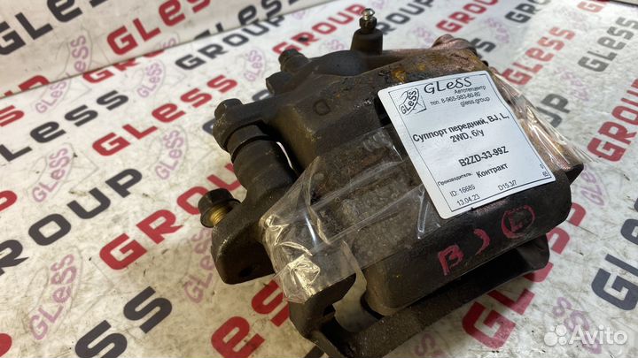 Суппорт передний BJ L 2WD б/у 323 Familia