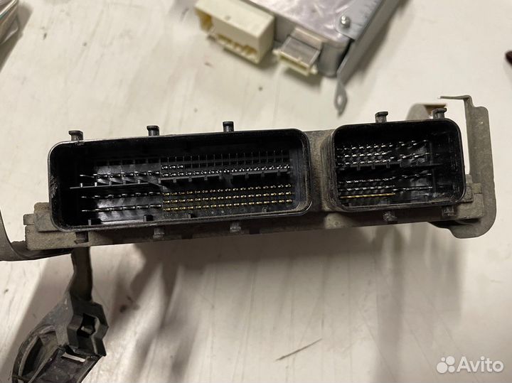 Блок управления двигателем Toyota Corolla E150