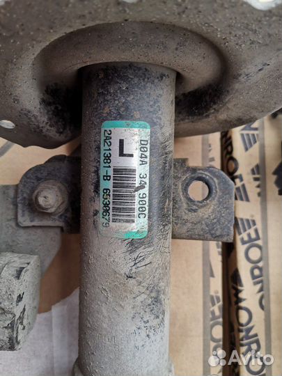 Передние стойки Mazda 2