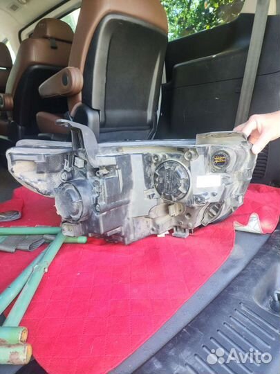 Фара левая Hyundai Grand Starex