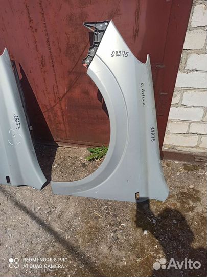 Опель астра Н Крыло левое оригинал (серебро)