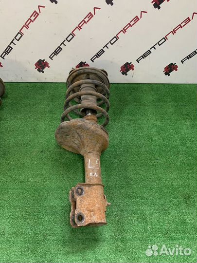 Амортизатор стойка лев прав Mitsubishi Lancer 9