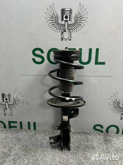 Стойка амортизатора передняя левая Nissan Teana