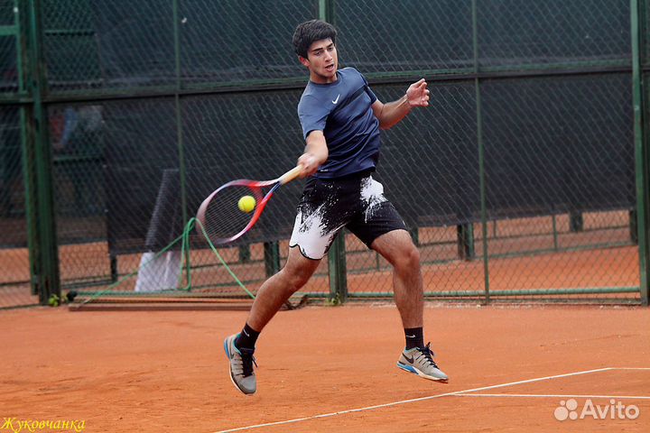 Тренер по большому теннису