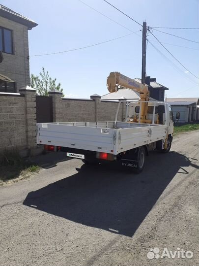 Бортовой грузовик Hyundai HD78 с КМУ ShinMaywa, 2010