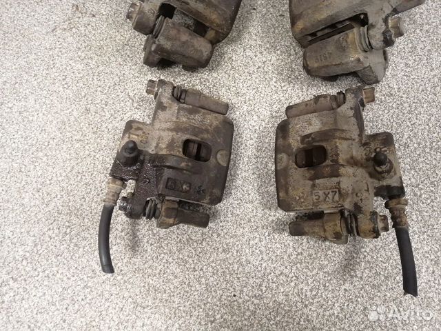 Суппорт тормозной задний Mitsubishi Outlander CU