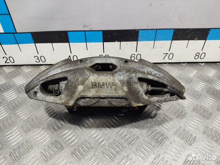 Б/У Суппорт тормозной передний левый BMW#001