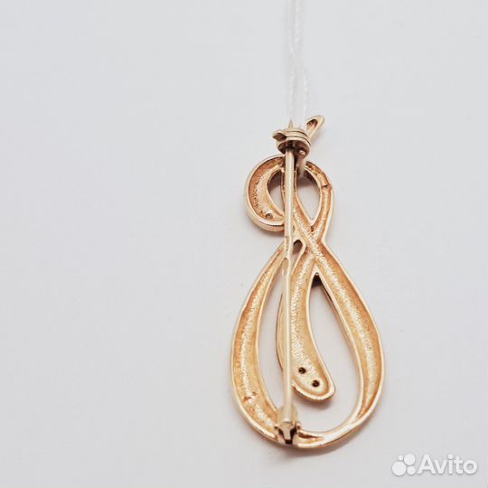 Золотая брошь с фианитом