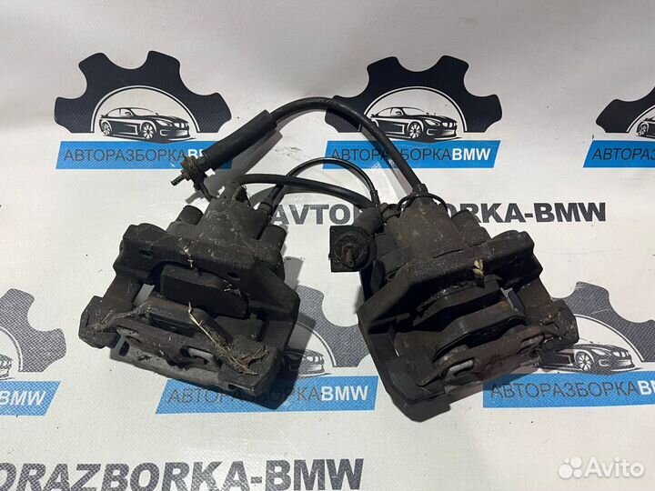 Суппорт тормозной задний левый правый BMW 5-серия