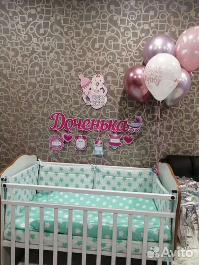 Детская кроватка с маятником