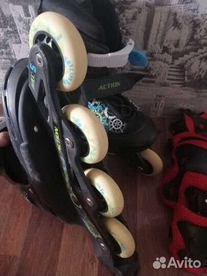 Роликовые коньки