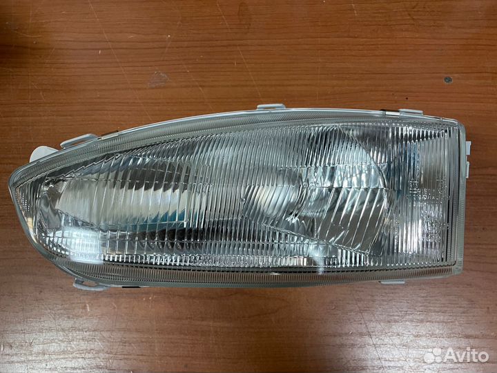 Фара передняя левая Mitsubishi Colt