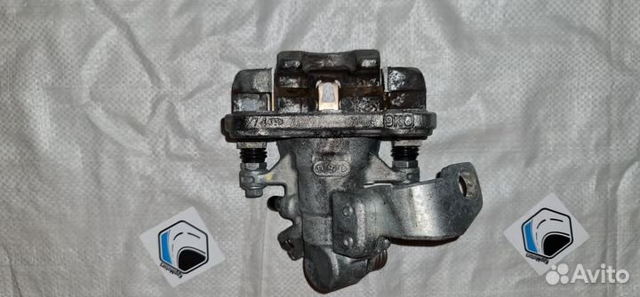 Суппорт тормозной задний левый Honda Civic 4D