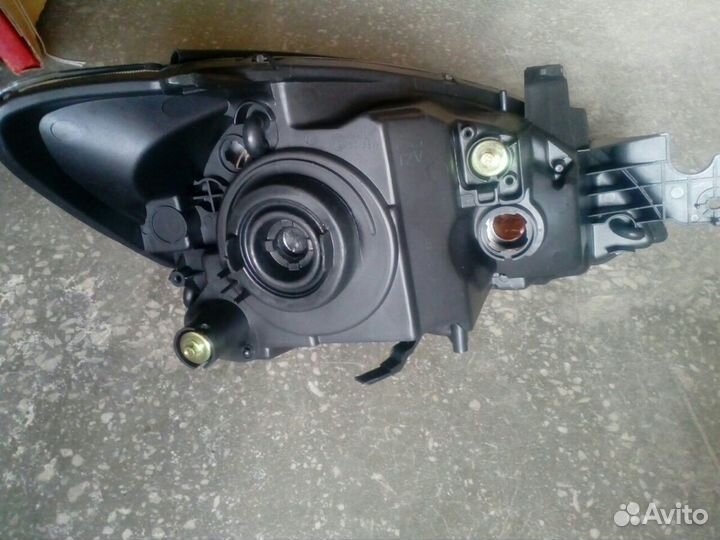 Фара левая Митсубиси Лансер 9 03-07 г.в