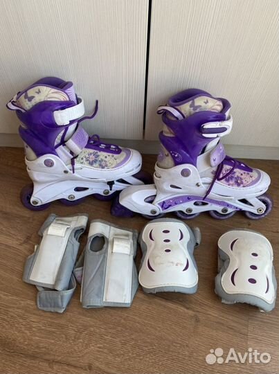 Роликовые коньки