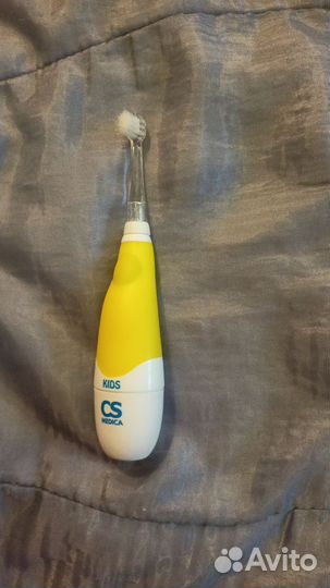 Электронная зубная щетка