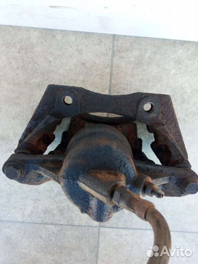 Суппорт тормозной передний левый Ford Mondeo 3