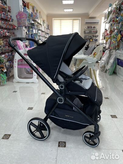 Коляска New Lux с реверсивным блоком