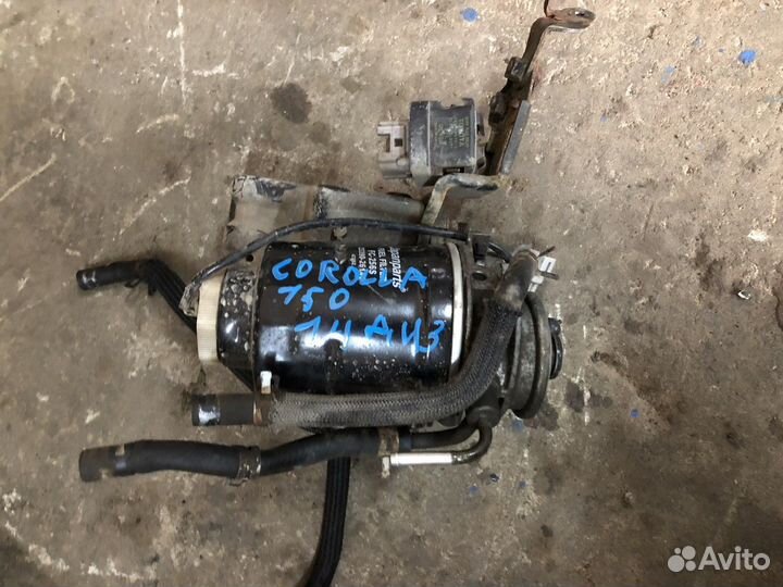 Корпус масляного фильтра (Toyota Corolla)