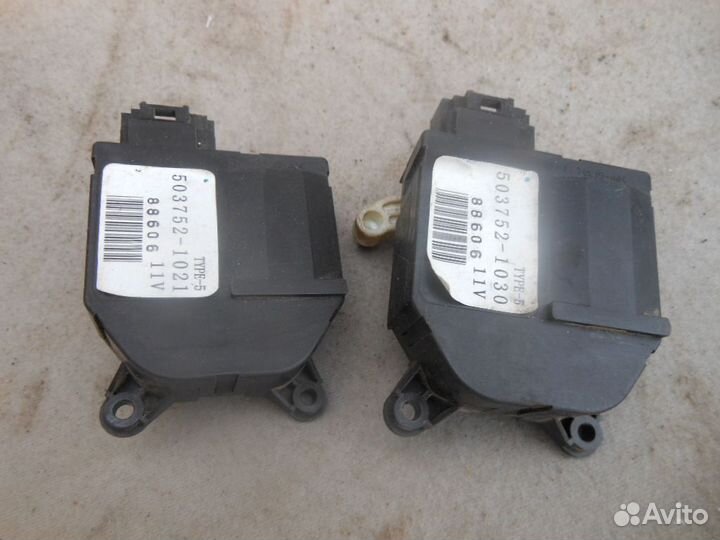 Моторчик заслонки отопителя Suzuki SX4 2006-2013