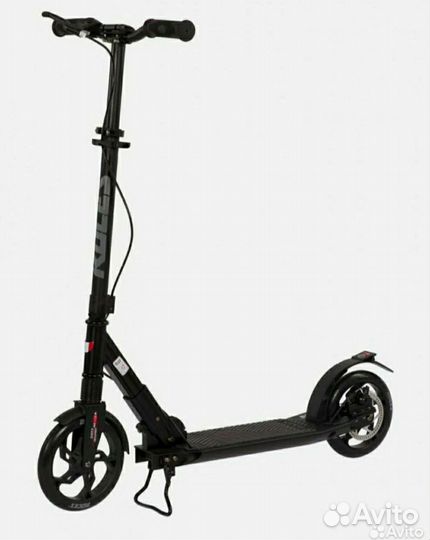 Самокат Roces с амортизатором и дисковым тормозом