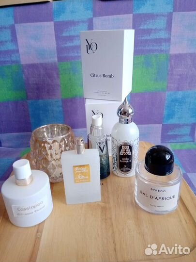 Флаконы от духов плюс подсвечник