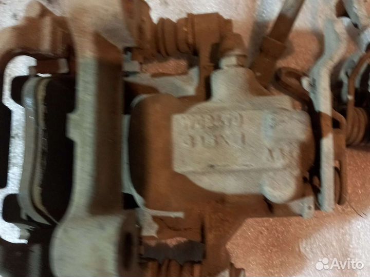 Суппорт задний VW Touran