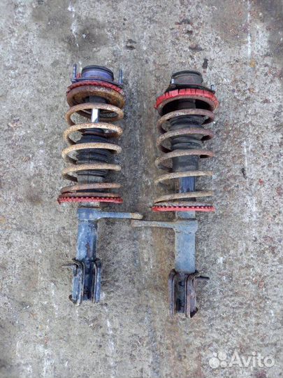 Стойка амортизатора передняя LADA 2110