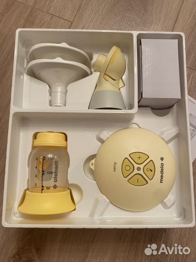 Молокоотсос электрический Medela Flex