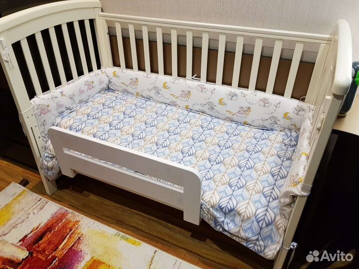 Бортик безопасности для детской кроватки