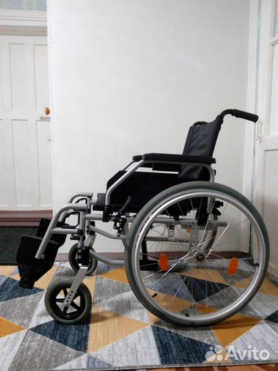 Инвалидная коляска