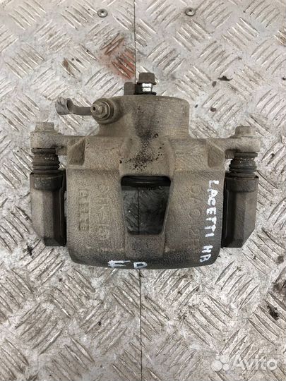 Суппорт передний правый Шевроле Лачетти