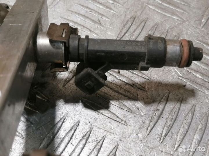 Форсунка двигателя Opel Corsa C