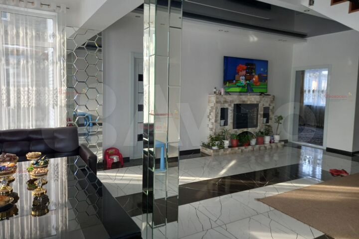 Коттедж 287 м² на участке 10 сот.