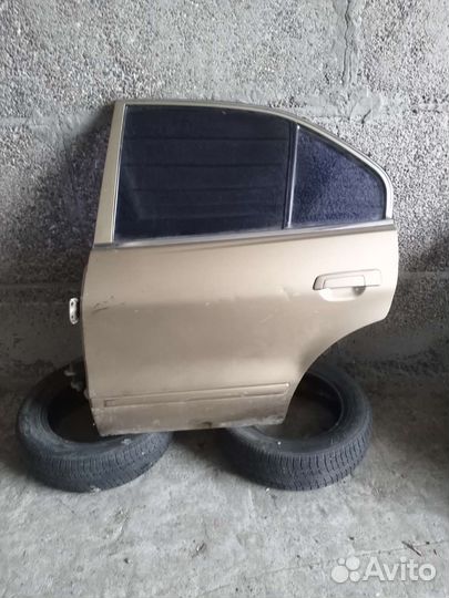 Задняя левая дверь mitsubishi galant 8