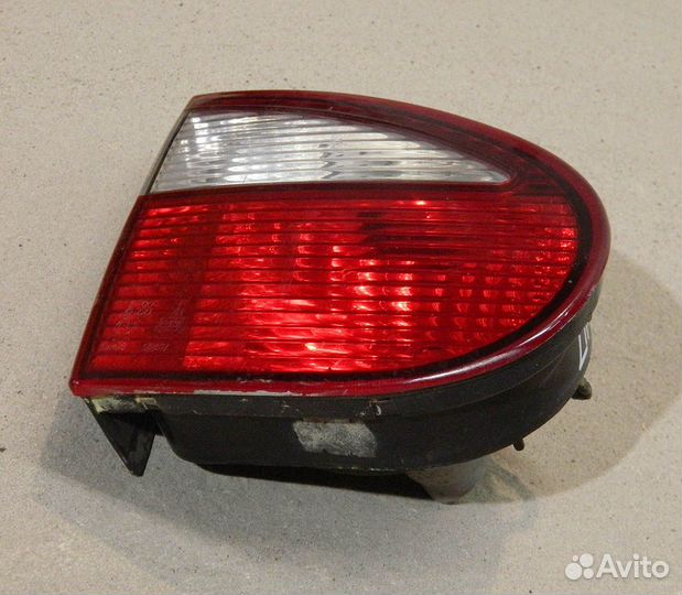 Фонарь багажника левый заз Sens