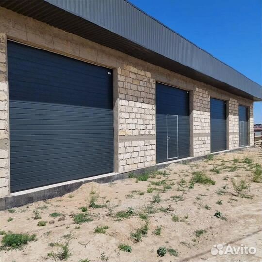 Высокие секционные ворота под ключ