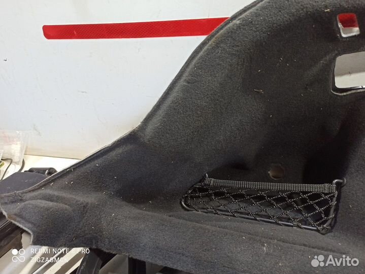 Обшивка багажника(левая) (Audi Q8)