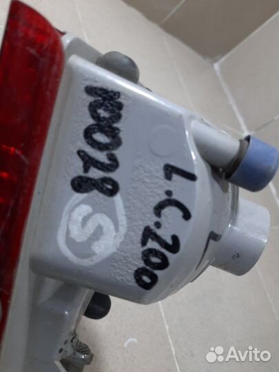 Фонарь задний противотуманный левый Toyota Land