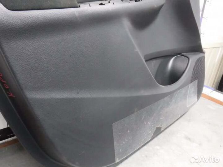 Обшивка двери передняя левая Toyota Corolla 151