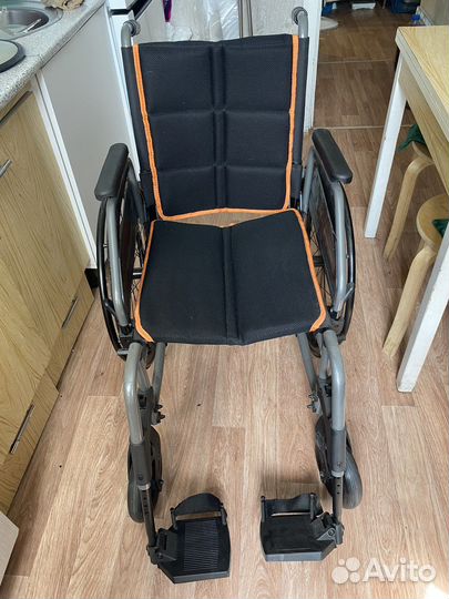 Инвалидная коляска