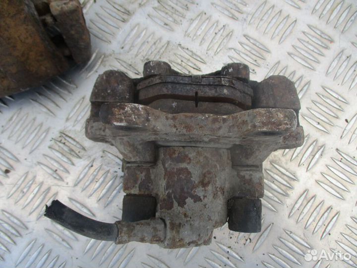 Суппорт тормозной задний BMW 5 E34 Цена за штуку