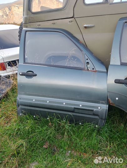 Двери на ниву Шевроле