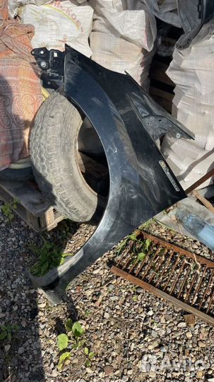 Крыло левое переднее honda fit